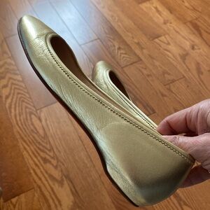 - Christian Louboutin Gold Ballet Flats